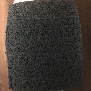 Black lace mini skirt